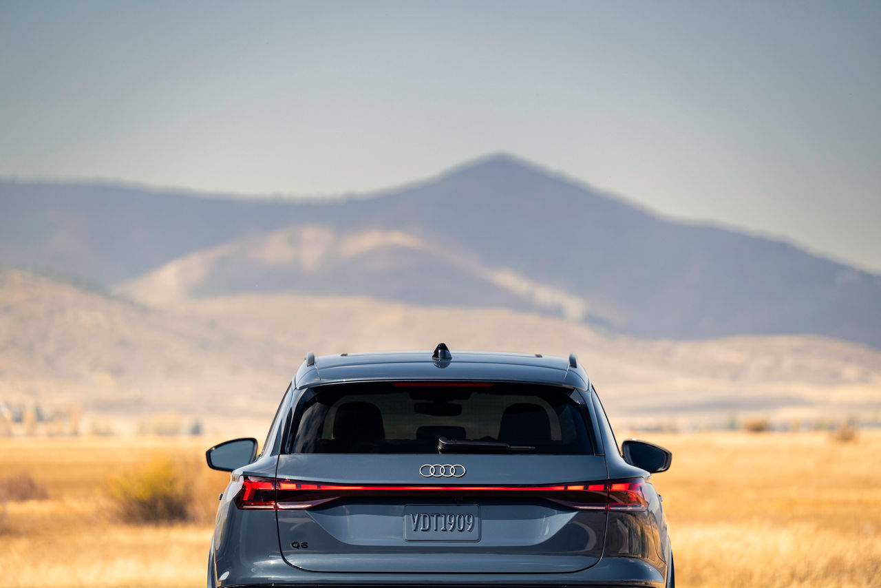Front profile view of an Audi Q7 accelerating.